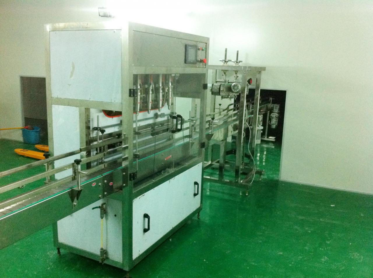 Linear filling machine with 4 filling heads LINEÁRNY PLNIČKA.jpg